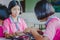 KANCHANABURI THAILAND - FEBRUARY 21 : Unidentified Local instructors teach Thai handicrafts to unidentified students on february