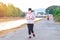 KANCHANABURI/THAILAND-MAY 7,2020 : Unidentified Thai sportive woman must wears protective mask on face jogging for good health due