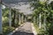 Kandy Peradeniya Botanical Gardens pergola wooden walkway with view into the distance