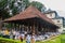 KANDY, SRI LANKA - JULY 19, 2016: White clothed Buddhist devotees at the grounds of the Temple of Sacred Tooth Relic