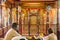 KANDY, SRI LANKA - JULY 19, 2016: White clothed Buddhist devotees in the Temple of Sacred Tooth Relic during Poya Full