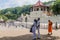 KANDY, SRI LANKA - JULY 19, 2016: White clothed Buddhist devotees visit Temple of the Sacred Tooth Relic during Poya