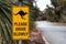 Kangaroo road sign. Please drive slowly yellow warning sign. Beware of kangaroos