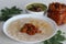 Kanji and Kadumanga. Rice gruel prepared with Kerala Matta rice. Served with raw banana curry and Kerala style cut mango pickle