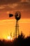 Kansas Blazing orange and yellow sky with a Windmill silhouette