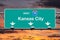 Kansas City Missouri 70 Freeway Sign with Sunset Sky