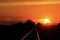 Kansas colorful Sunset and sky with a railroad track out in the country.