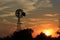 Kansas colorful Sunset with yellow and orange sky with a Windmill silhouette