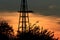 Kansas colorful Sunset with yellow and orange sky with a Windmill silhouette