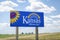 Kansas welcomes you - welcome roadside sign with a popular Latin phrase ad astra per aspera