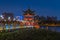Kaohsiung`s famous tourist attractions aerial view, Beautiful decorated traditional Chinese Pagoda with Kaohsiung city in