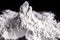 Kaolin on isolated black background, is an inorganic mineral, chemically inert, used in several branches of industry, from