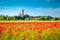 Kap Arkona lighthouse with red poppy flowers in summer, RÃ¼gen, Ostsee, Germany