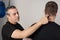 Kapap instructor shows the critical points. Pressure points fighting concept