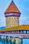 Kapellbrucke wooden bridge and Wasserturm tower, the medieval landmarks of Lucerne, Switzerland