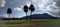 Kapiolani Park at during day with Diamond Head and clouds