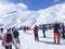 KAPRUN, AUSTRIA, March 12, 2019: Skiers are getting out from Cable car ski lift at Alpin center on the top of the