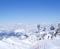 KAPRUN, AUSTRIA, March 12, 2019: View from top of ski resort Kaprun on mountain peaks and snow covered slopes with Cable