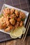 Karaage - Japanese style fried chicken closeup. Vertical top vi