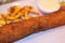 Karadjordjeva schnitzel, Karageorge Schnitzel, serbian breaded cutlet, rolled veal pork steak on a plate with french fries and