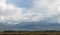 Karakol on the background of mountains. Issyk Kul, Kyrgyzstan