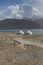 Karakul Lake, China National Highway 314 - The Karakoram Highway, ChinaÃ¢â‚¬â„¢s Xinjiang region. Truck on the Old Silk road