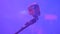 Karaoke club, professional vocal microphone on microphone stand on stage.