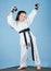 Karate fighter ready to fight. Karate sport concept. Self defence skills. Karate gives feeling of confidence. Strong and