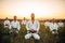 Karate group sitting on the ground and meditates