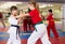 Karate kids training in gym