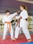 Karate kids training in gym