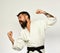 Karate man training. Master of kung fu with beard