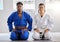 Karate, man and woman in portrait together with focus determination for fitness, wellness or training. Couple, martial
