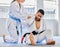 Karate, neck pain and man with an injury in sports training, exercise or body workout hurt in an accident. Problem