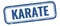 KARATE text on blue grungy vintage stamp