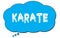 KARATE text written on a blue thought bubble