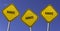 Karate - three yellow signs with blue sky background