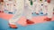 Karate training - group of karateka teenagers in red shoes and white kimono