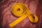 Karate yellow belt on red background