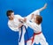 In karategi small athletes train kick leg and punch arm