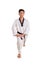 Karateka guy legs stretching by bending knee, full length isolated