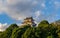 Karatsu japanese Castle Karatsu-jo Located on hill and blue sky with clouds in evening