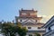 Karatsu japanese Castle Karatsu-jo Located on hill and sunset sky with clouds in evening, Karatsu, Saga, Kyushu, Japan