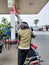 Karawang, Indonesia, 16 September 2022: Queue for refueling at the fuel station
