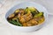 Kare kare; a mix of ox tail and tripe with vegetables like eggplant, sitaw long bean, pechay, puso ng saging stewed in peanut sa