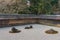 The Kare-sansui dry landscape zen garden at Ryoan-ji Temple in Kyoto, Japan. It is part of Historic