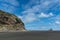 Karekare Beach with the Watchman Rock in distance.