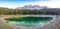 Karersee or Lago di Carezza, is a lake with mountain range of the Latemar group on background in the Dolomites in Tyrol