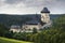 Karlstein castle on cloudy sky