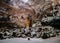 Karst cave Grotte di Castellana, Italy with beautiful lights and stone statues